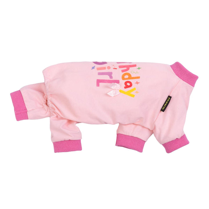 Side view of pink birthday girl dog pajamas showing soft fabric, ribbed cuffs, and cozy fit.