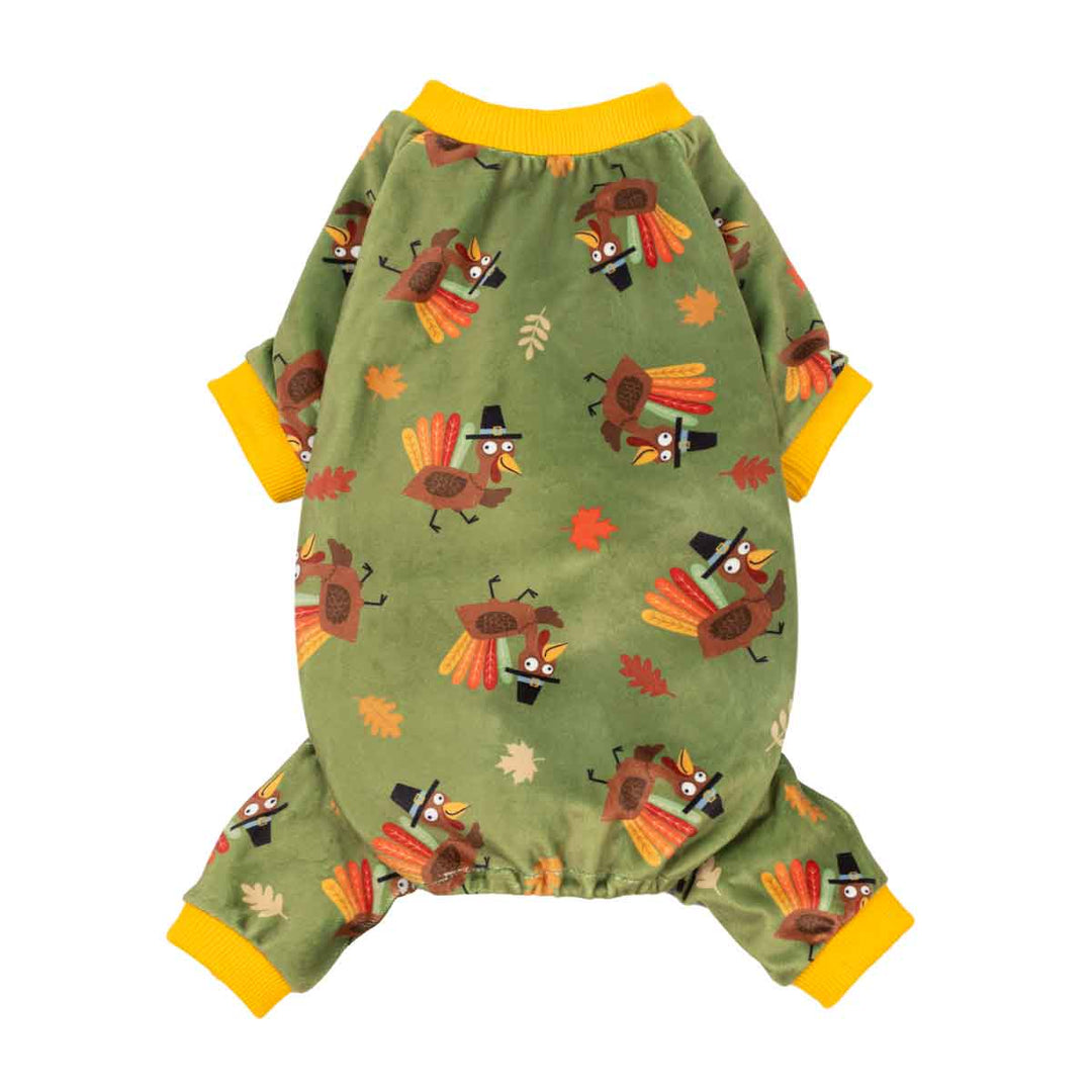Green dog onesie with a Thanksgiving turkey pattern, featuring bright yellow cuffs and collar, shown on a plain white background