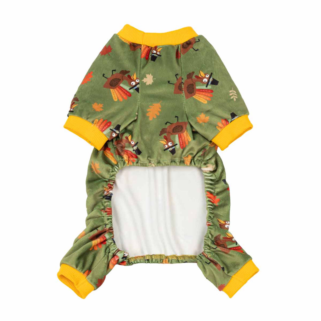 Small green dog Thanksgiving onesie with a cartoon turkey print, yellow trim, and a white fleece lining, shown flat on a white background