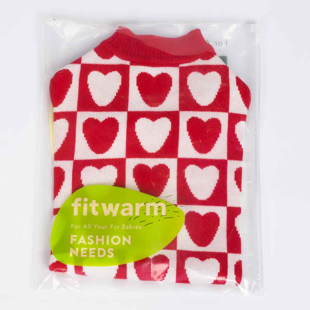 Red heart checkered dog sweater folded inside clear Fitwarm packaging bag