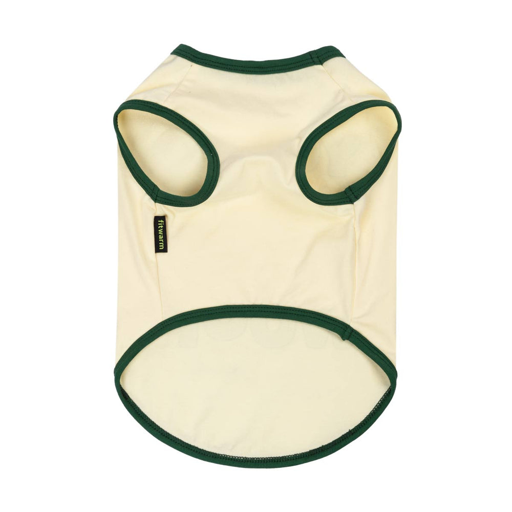Beige dog tank top with green trim on a white background