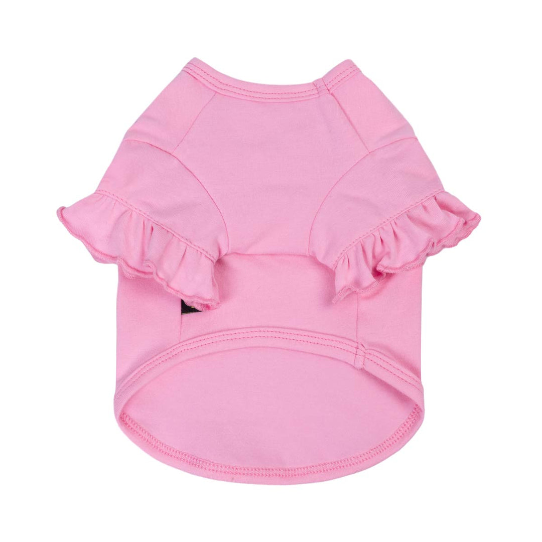 Pink shirt for dogs with ruffles on a white background