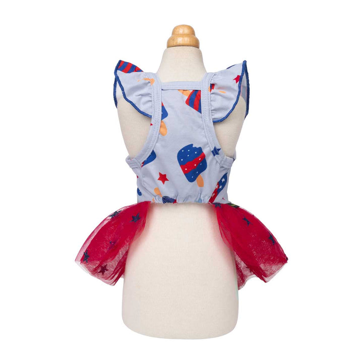 Ruffle dog patriotic dress with colorful design on a mannequin against a white background