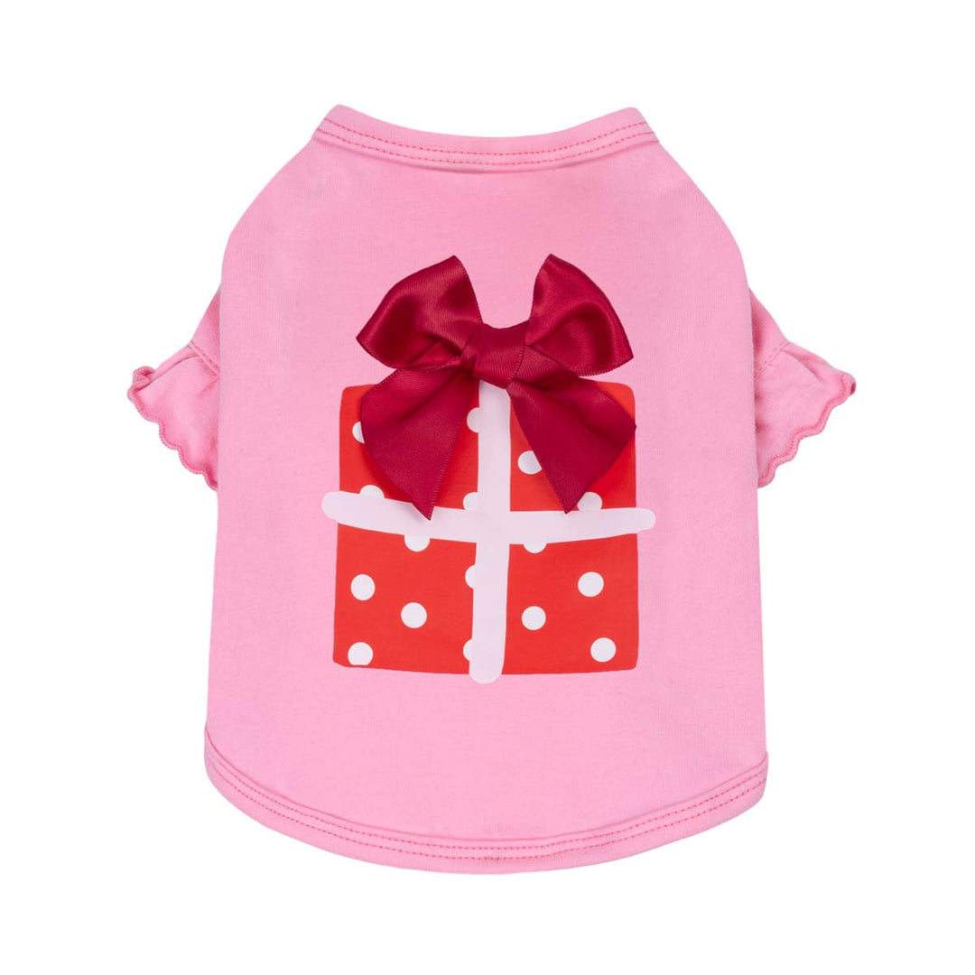 Pink dog shirt with a red bow and gift box design on a white background