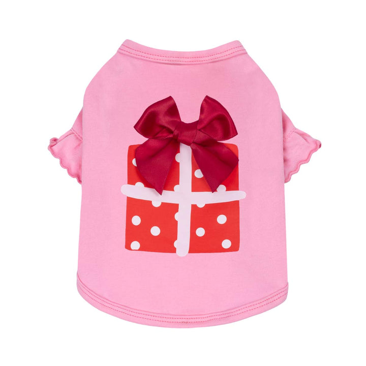 Pink dog shirt with a red bow and gift box design on a white background
