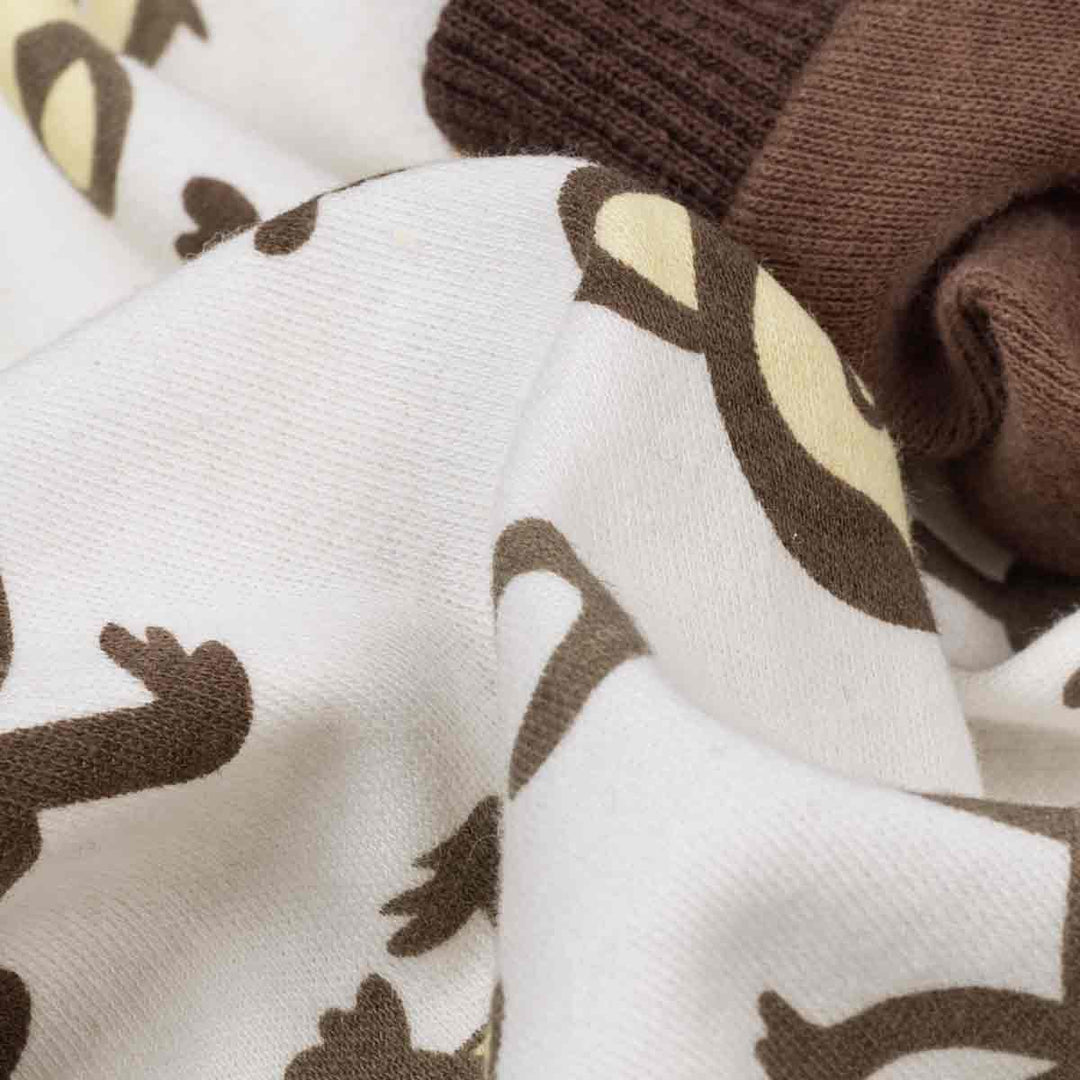 Close-up of fabric with monkey pattern on a white background
