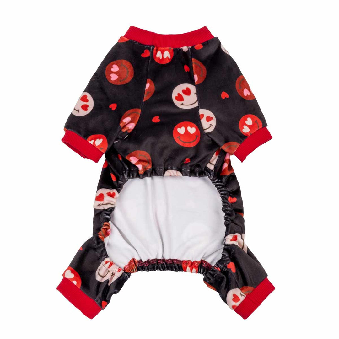 Black dog pajamas with red heart-eyes smiley pattern. Soft fabric with red trim.