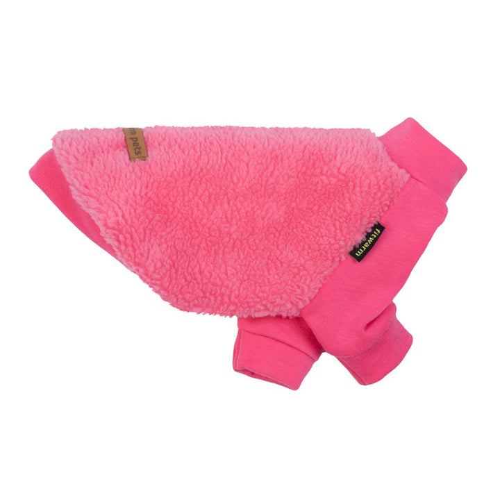 Side view of pink sherpa dog sweater with cozy pullover design.