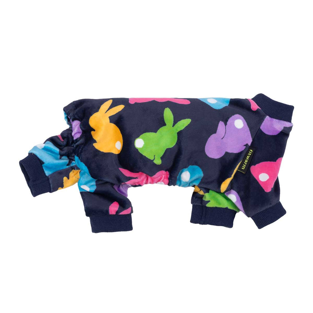 Side view of navy dog pajamas with colorful bunny print and stretchy leg cuffs.