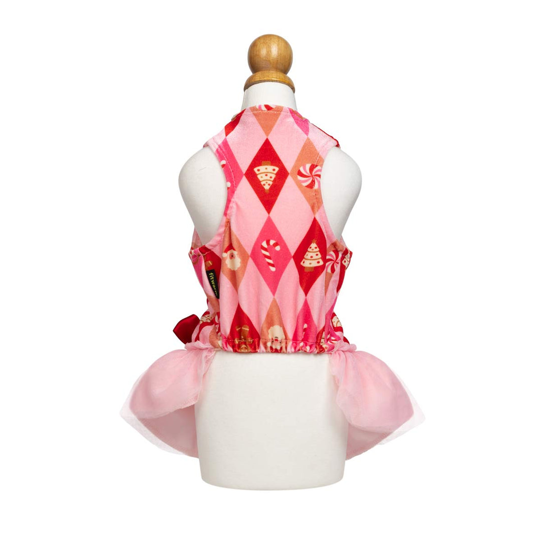 Pink and red patterned dog tulle dress displayed on a white mannequin torso with a diamond pattern in candy motifs and a layered pink tulle skirt
