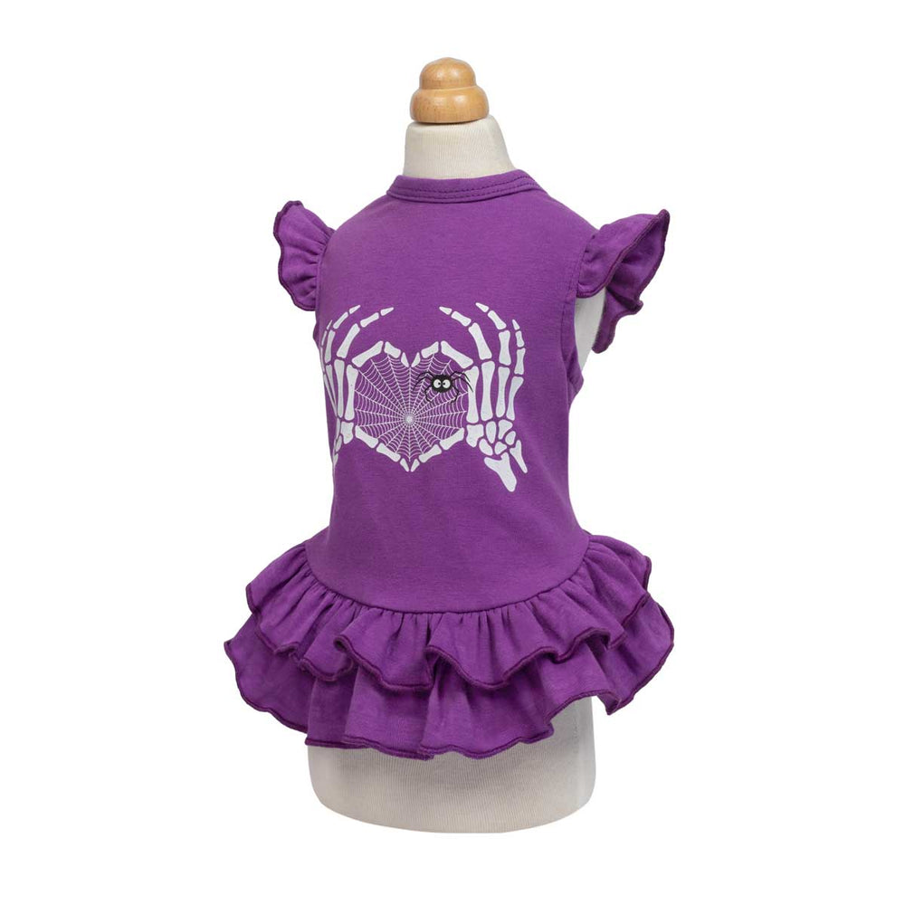 Ruffled Halloween dress for dogs with a spooky skeleton hands heart and spider web prints