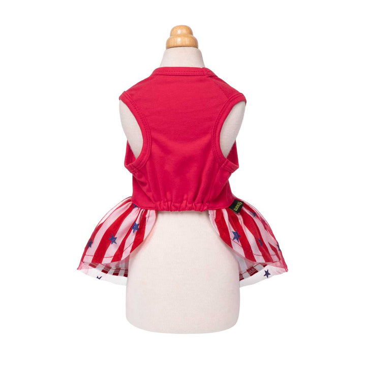Red dog patriotic dress and plaid star skirt set on a mannequin against a white background