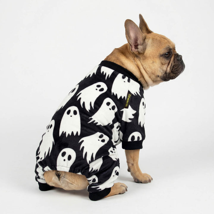 French Bulldog wears a black and white Halloween dog pjs with scary ghost prints