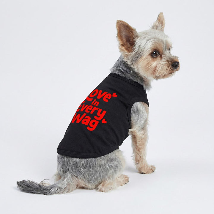 Yorkie sitting in sleeveless dog shirt designed for Valentine season