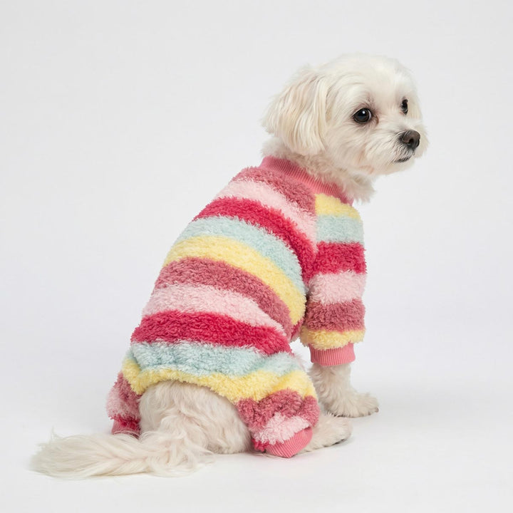 Small dog sitting in striped pajamas for dogs with cozy relaxed fit