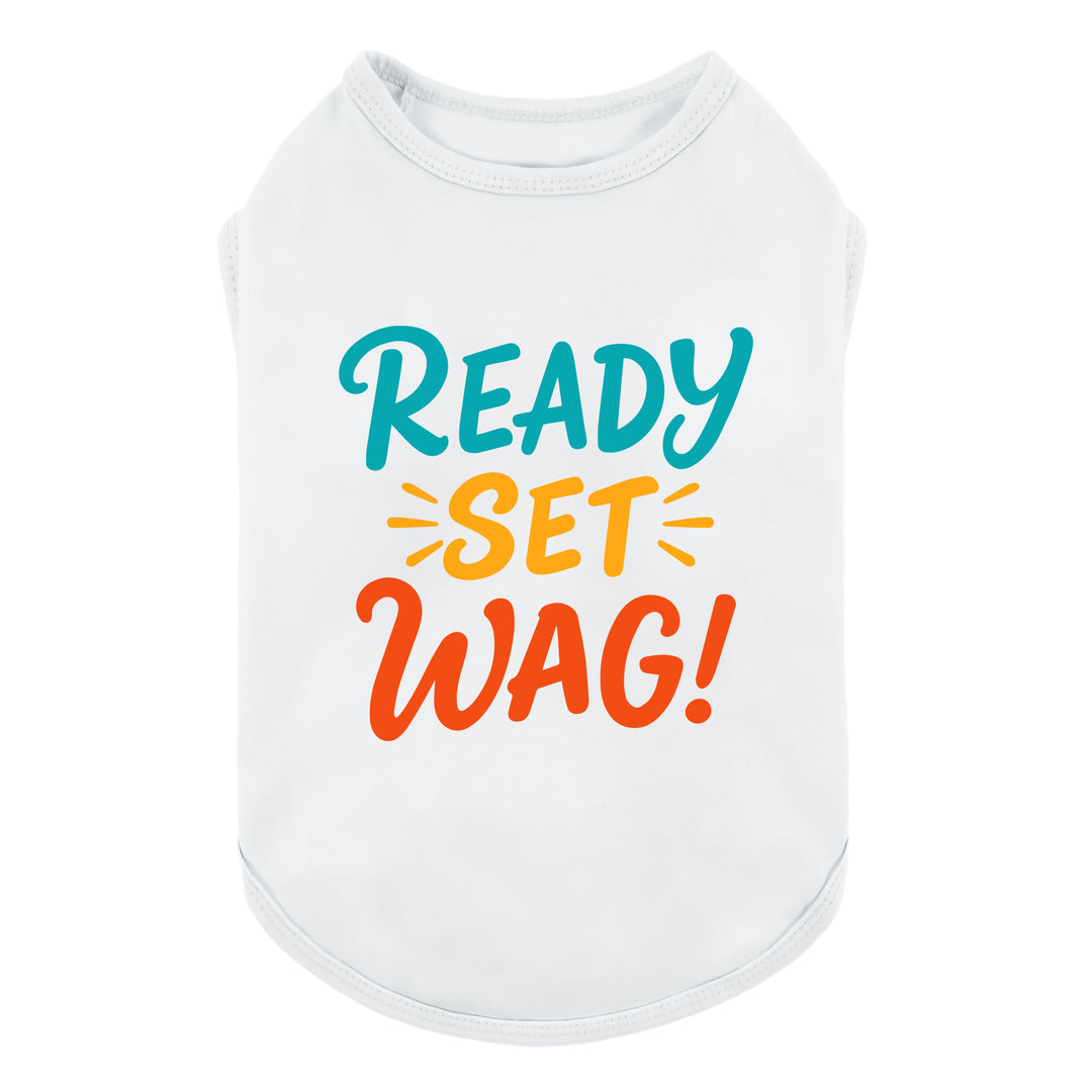 Dog shirt featuring a white tank-style design with colorful "Ready Set Wag!" lettering on the front.