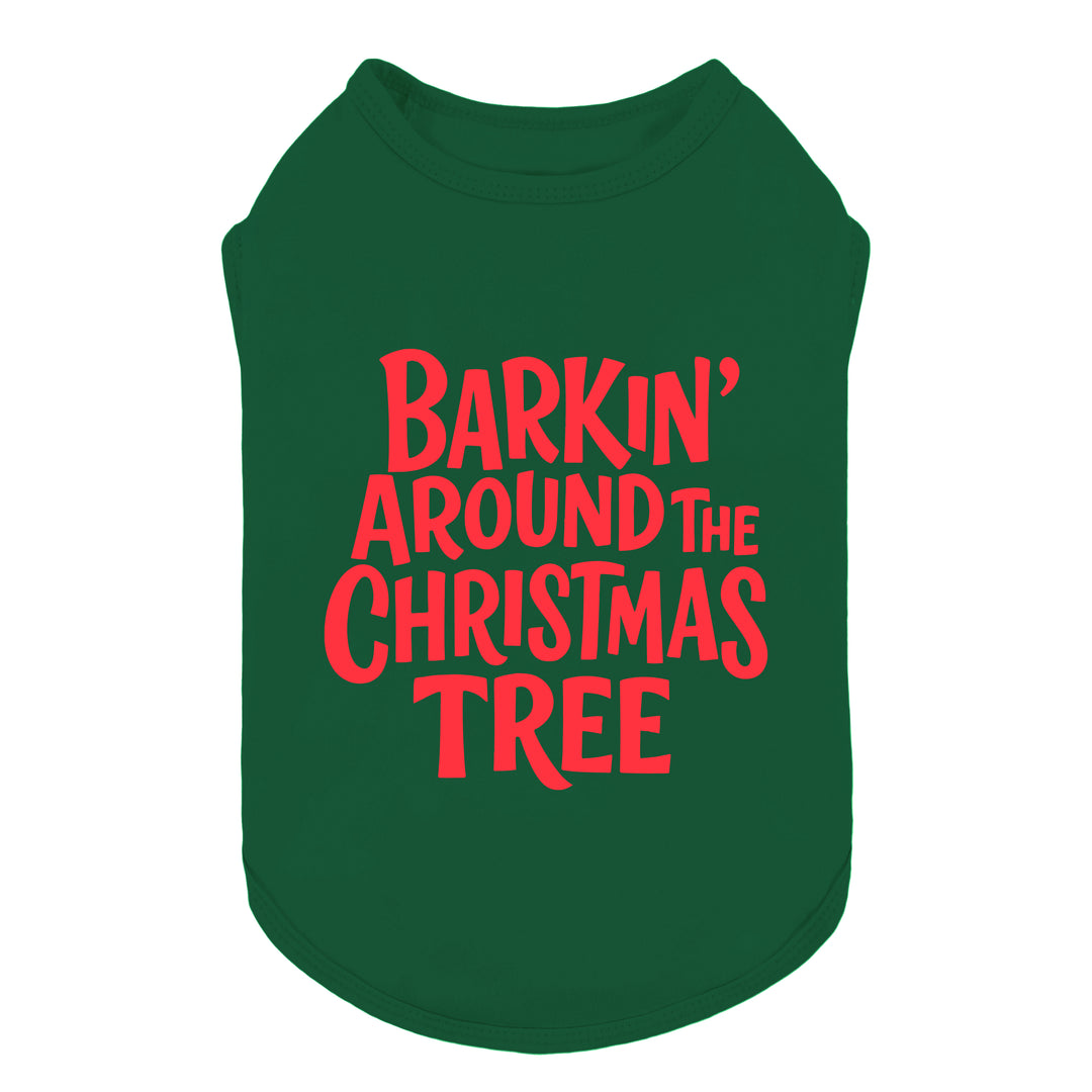 Green dog shirt with red “Barkin’ Around the Christmas Tree” text design for festive style.