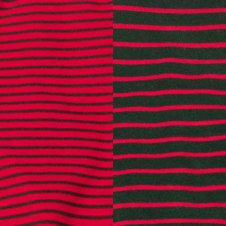 Close-up of a striped fabric pattern with alternating red and dark green horizontal stripes, split vertically into two sections