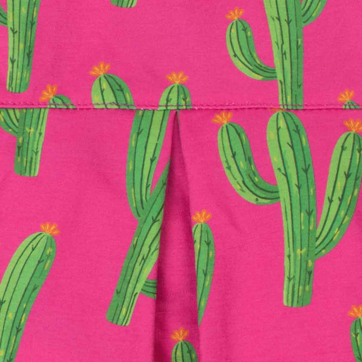 Close up of cactus print and pleated detail on pink dog shirt for dogs