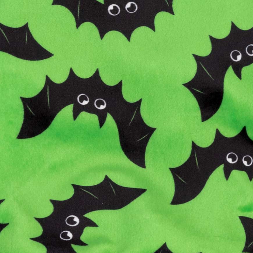 Soft lime green fleece fabric with black cartoon bat prints and white cartoon eyes, ideal for Halloween dog apparel.