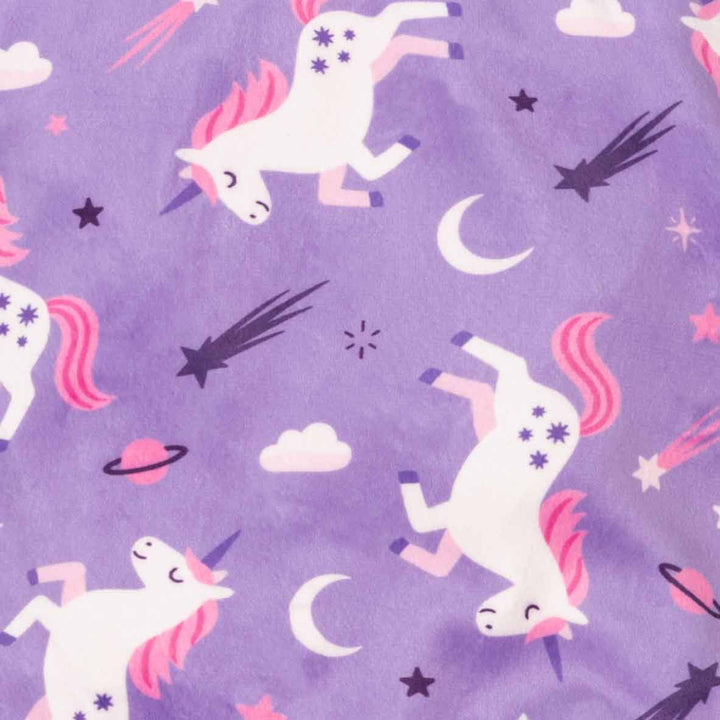 Purple fabric with a repeating pattern of white unicorns, pink manes, black stars, and white crescent moons
