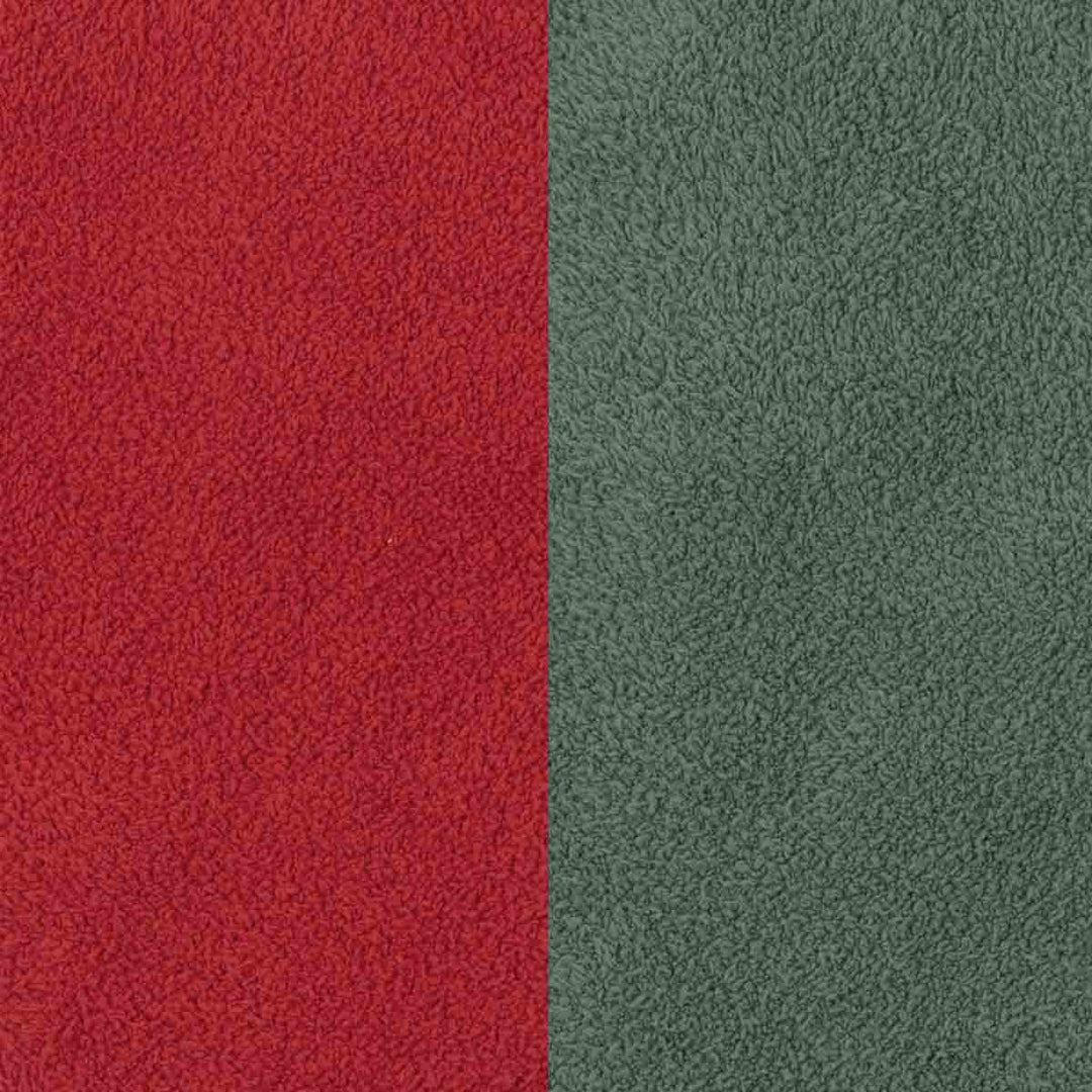 Close-up of a textured fabric shown in two vertical color blocks: red on the left and muted green on the right