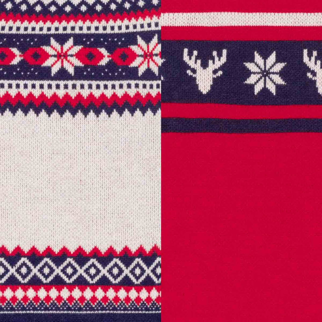 Close-up of a knit holiday dog sweaters fabric with a red, navy, and white Fair Isle pattern on the left and a solid red section with a navy band and white snowflake and deer motifs on the right