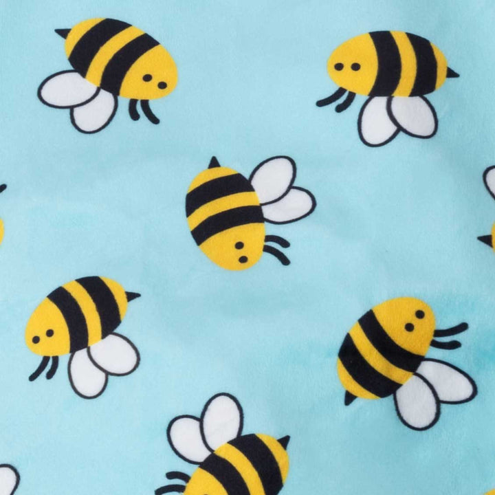 Blue dog pajamas with a pattern of yellow and black bees and white wings.