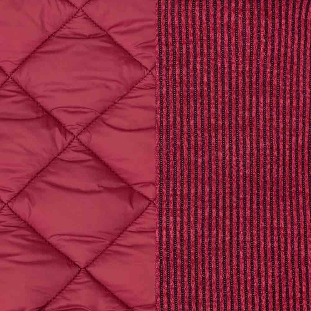 Berry red quilted dog coat with diamond stitching juxtaposed with a black and red striped knit fabric.