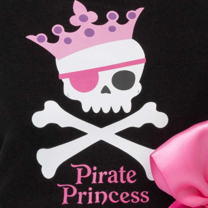 Close-up of a black Halloween dog tulle dress featuring a pirate skull and crossbones graphic with a pink crown, pink eyepatch, and the words 'Pirate Princess' in pink