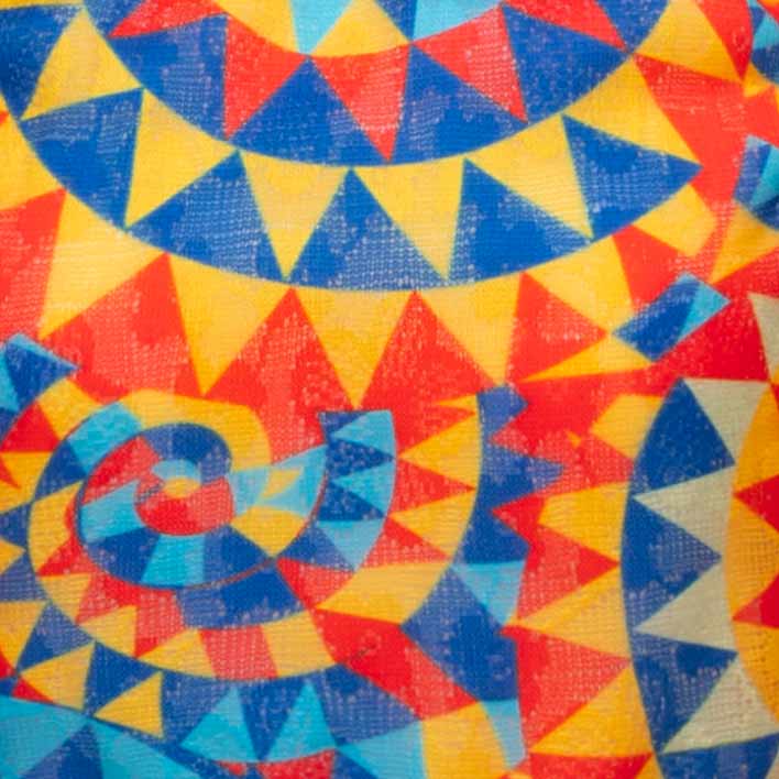 Colorful kaleidoscope pattern with triangles in red, yellow, and blue