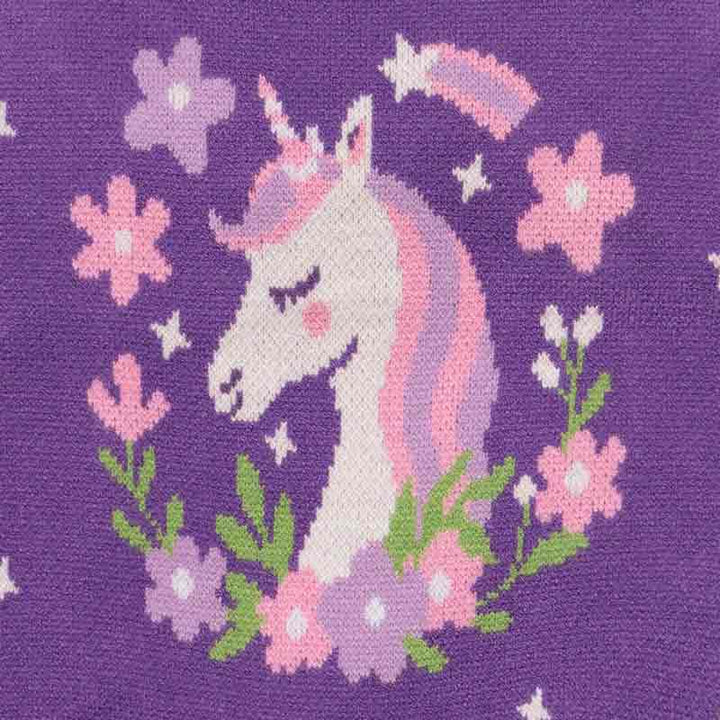Detailed view of unicorn and floral knit design on purple dog sweater.