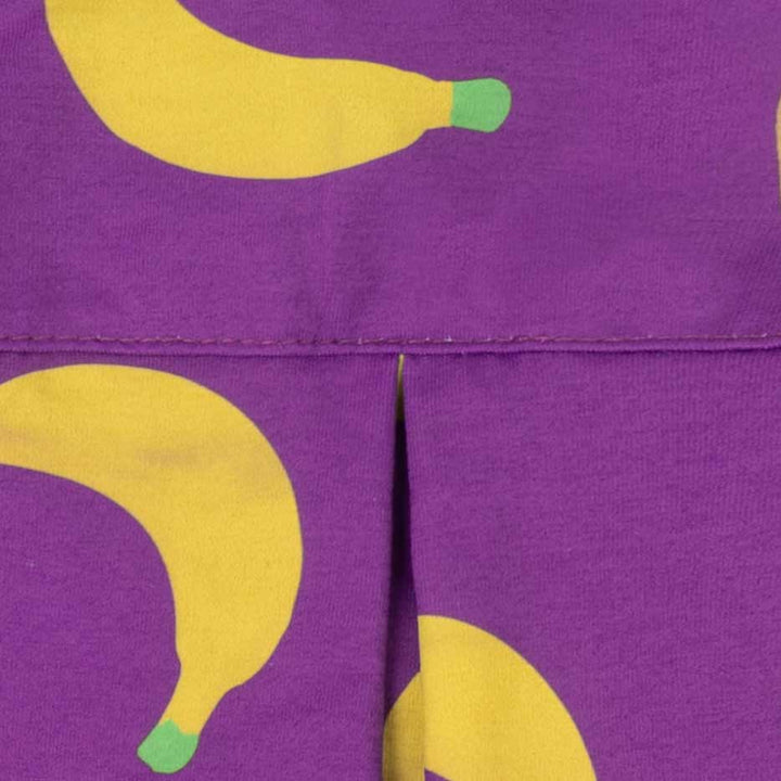 Purple fabric with yellow banana patterns