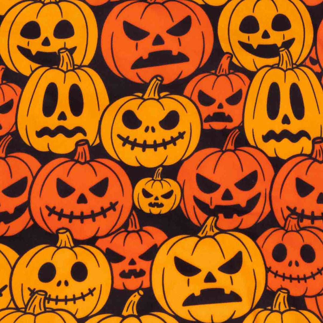 Repeating Halloween pattern of carved jack-o'-lantern pumpkins in orange, red, and yellow on a black background