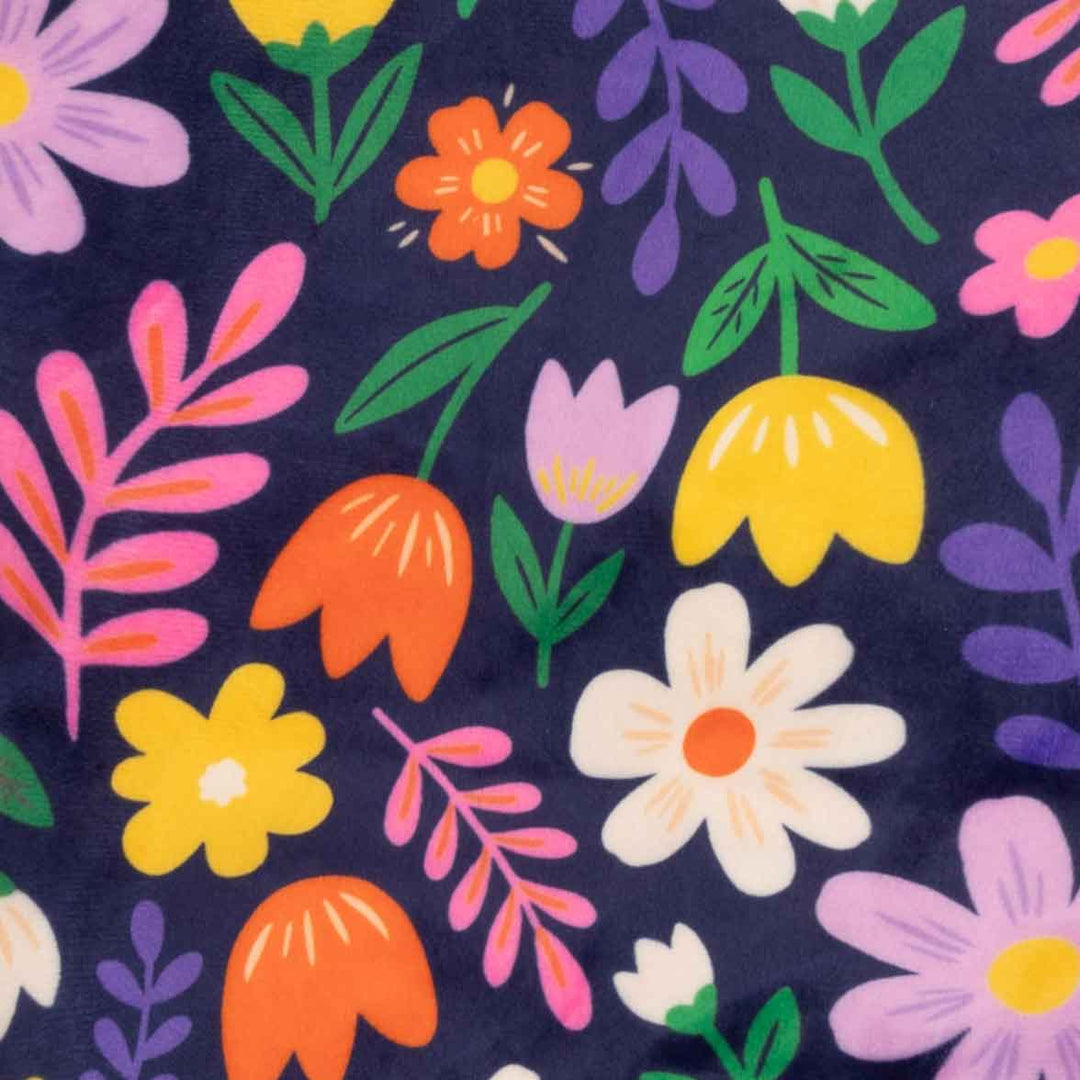 Close up of flower prints on dog onesie