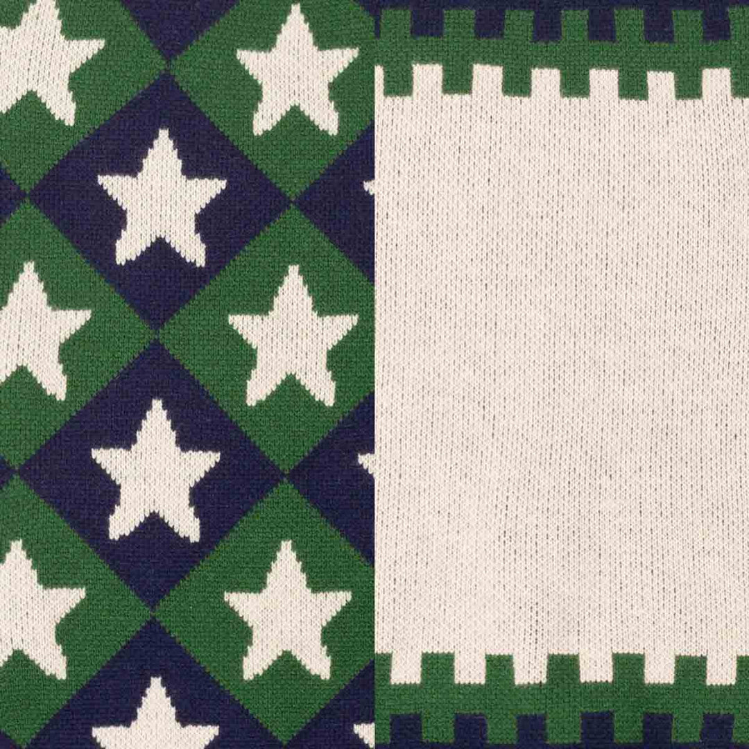 Close-up of a knitted textile pattern split vertically: the left half shows green and navy diamonds with white stars, and the right half shows a green and navy color block pattern