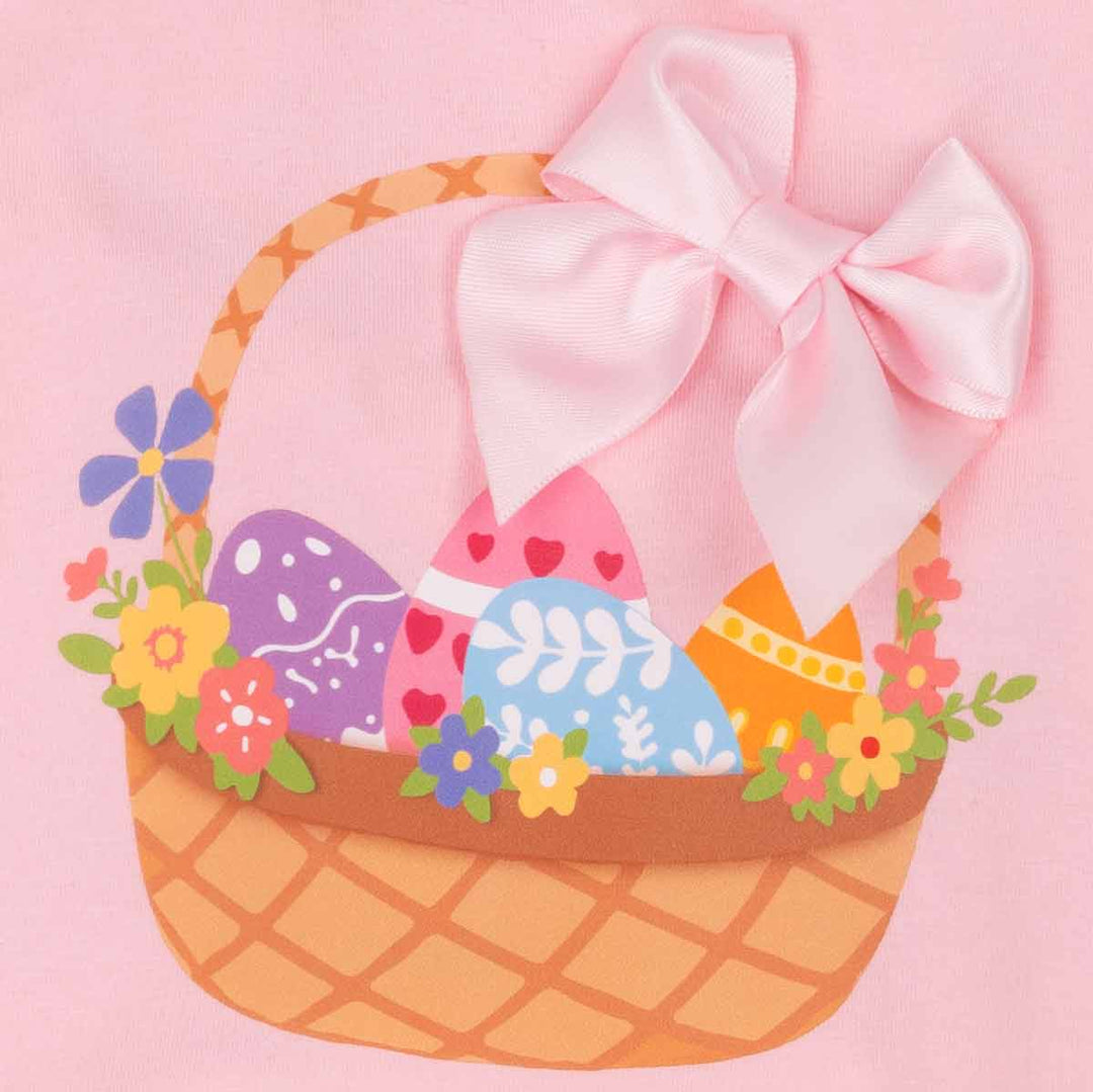 Close up Easter basket graphic and bow on pink dog shirt