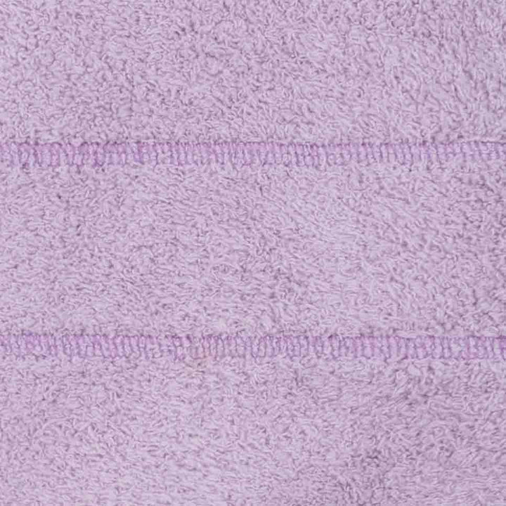 Textured lilac fleece fabric detail from warm dog pajamas.