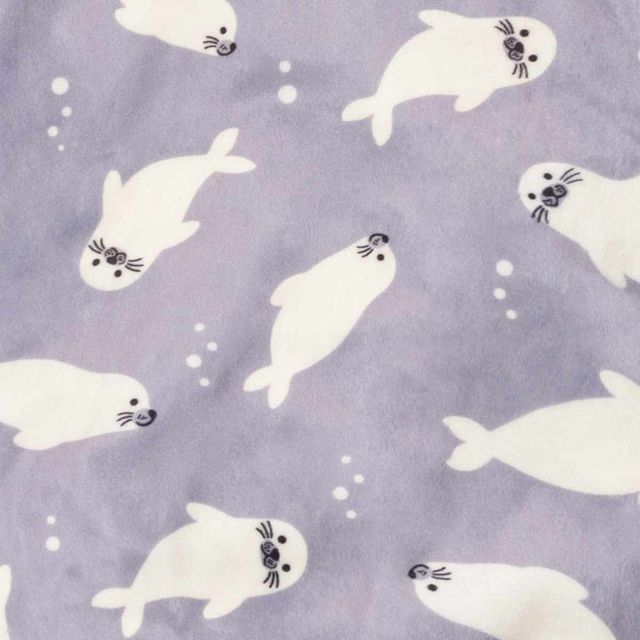 Pattern of white seals on a light purple background