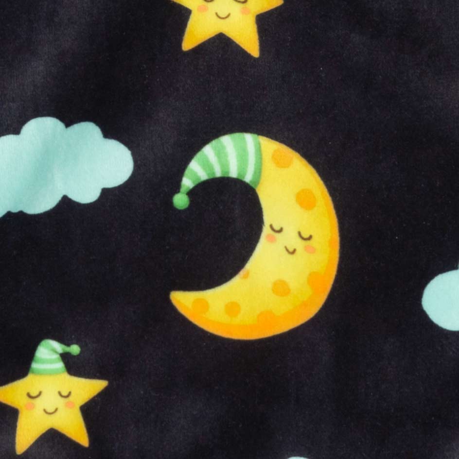 Closeup of dog pajamas velvet fabric with moon star and cloud print on black