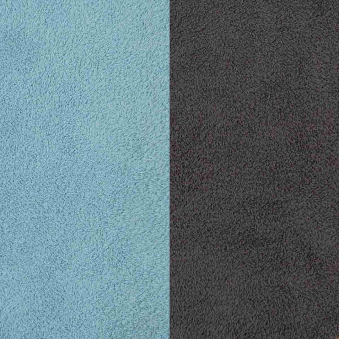 Two vertical color swatches showing textured fabric in light blue on the left and very dark charcoal gray on the right