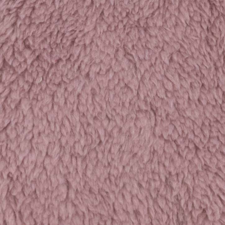 Close-up view of the soft mauve fleece fabric used in warm dog pajamas.