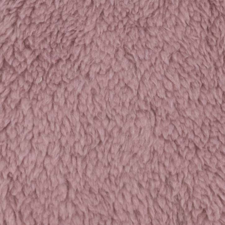Close-up view of the soft mauve fleece fabric used in warm dog pajamas.