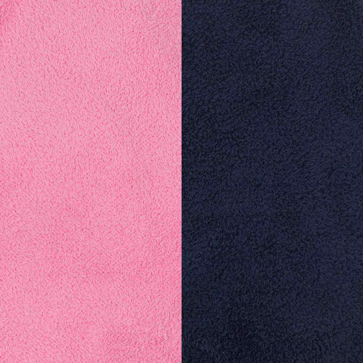 Close-up view of two textured fabric surfaces: a bright pink material on the left and a dark navy material on the right