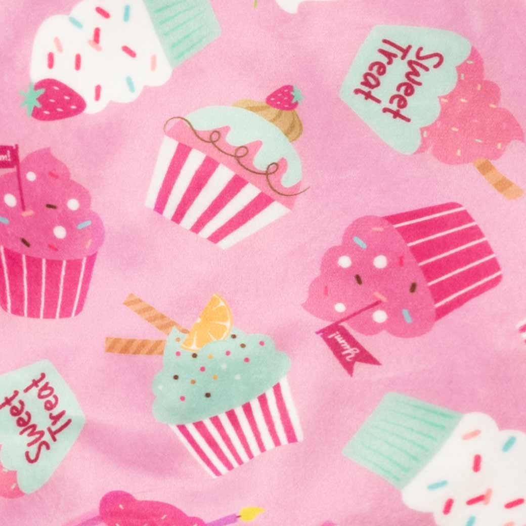 Pink dog pajamas with a repeating pattern of cute cupcakes and ice cream cones, including "Sweet Treat" text.