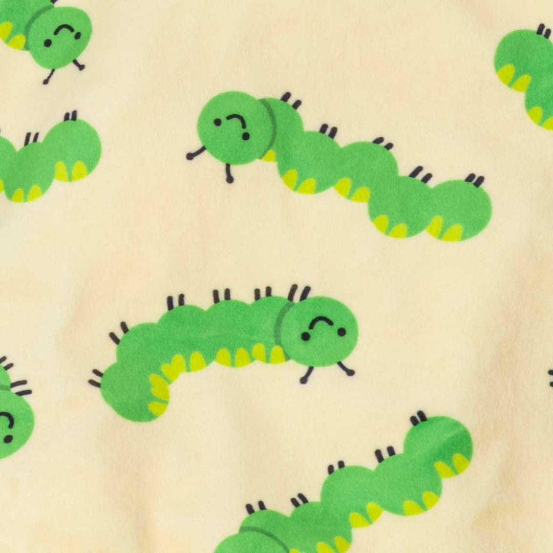 Soft, playful fabric with green cartoon caterpillar print for dog pajamas.