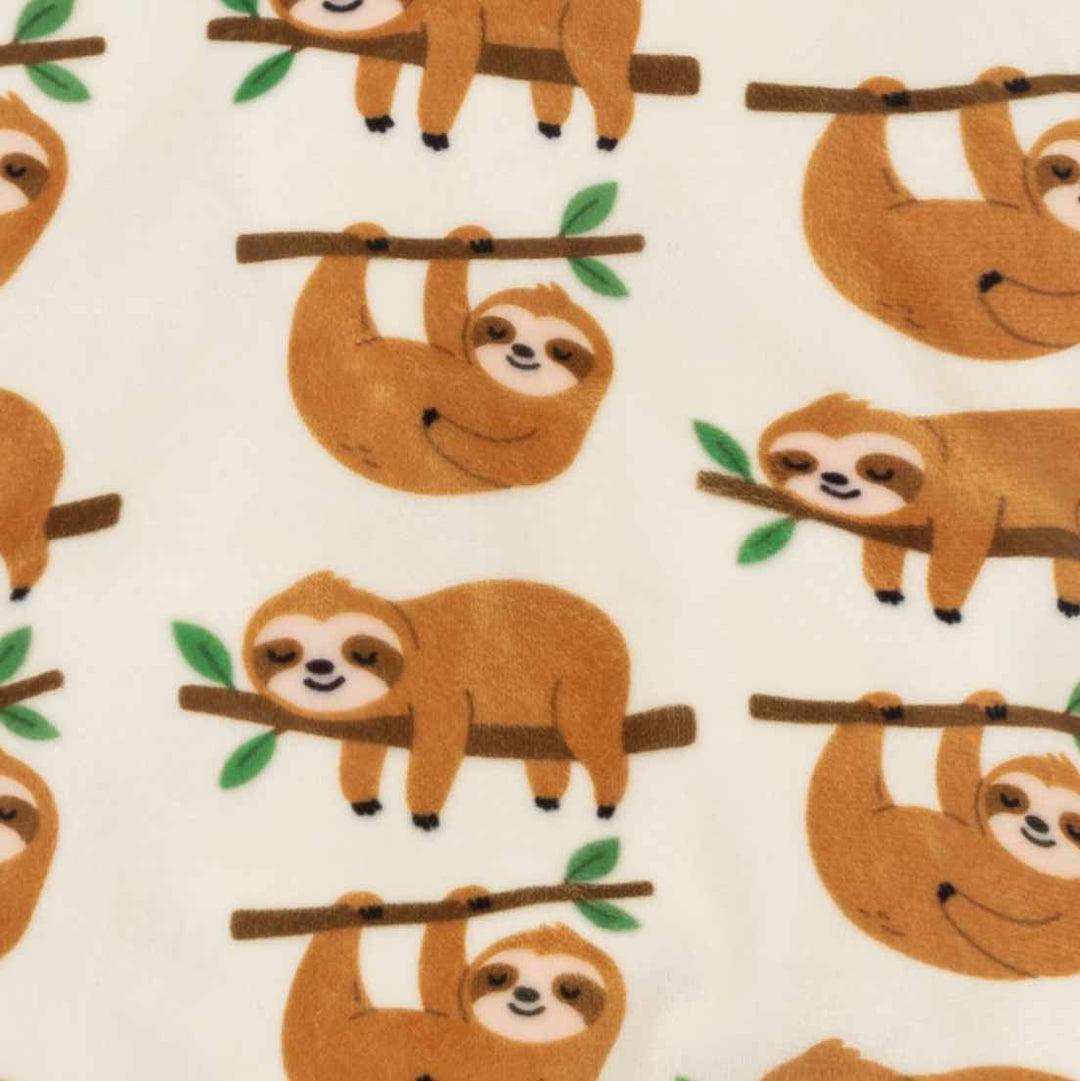 Dog pajamas fabric featuring a repeating lazy sloth print on branches.