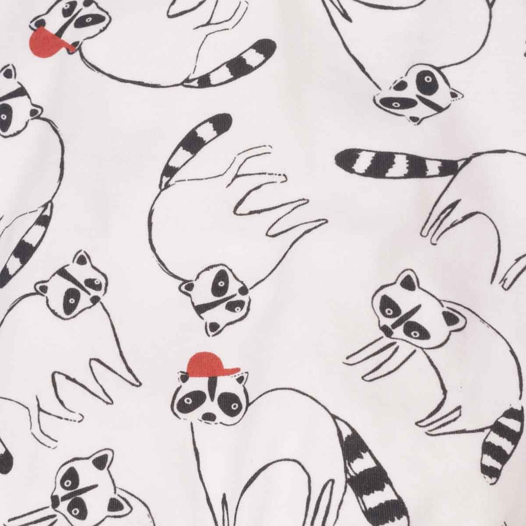 Pattern of black and white raccoons with red hats on a light gray background