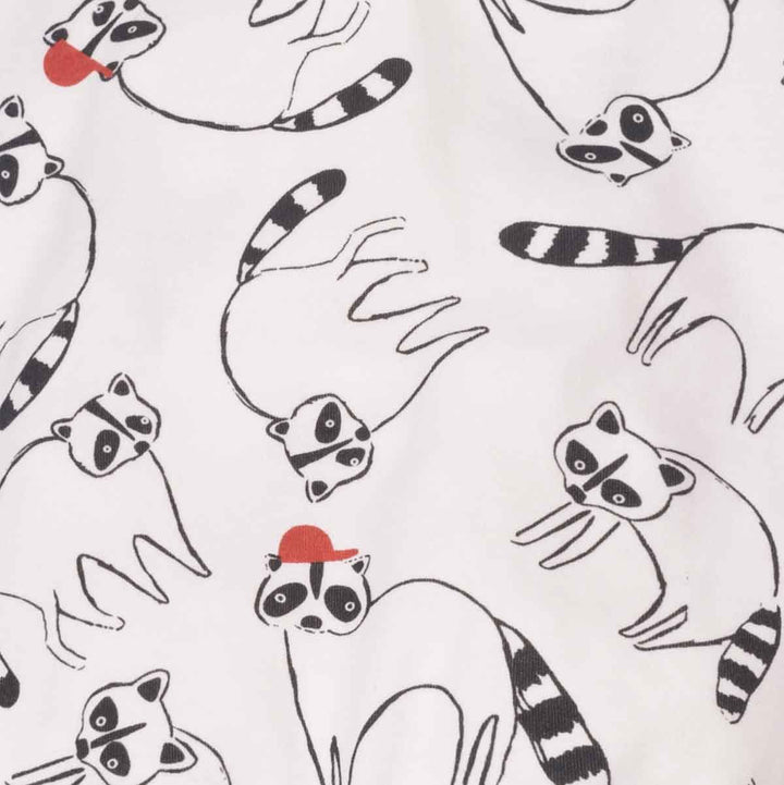 Pattern of black and white raccoons with red hats on a light gray background