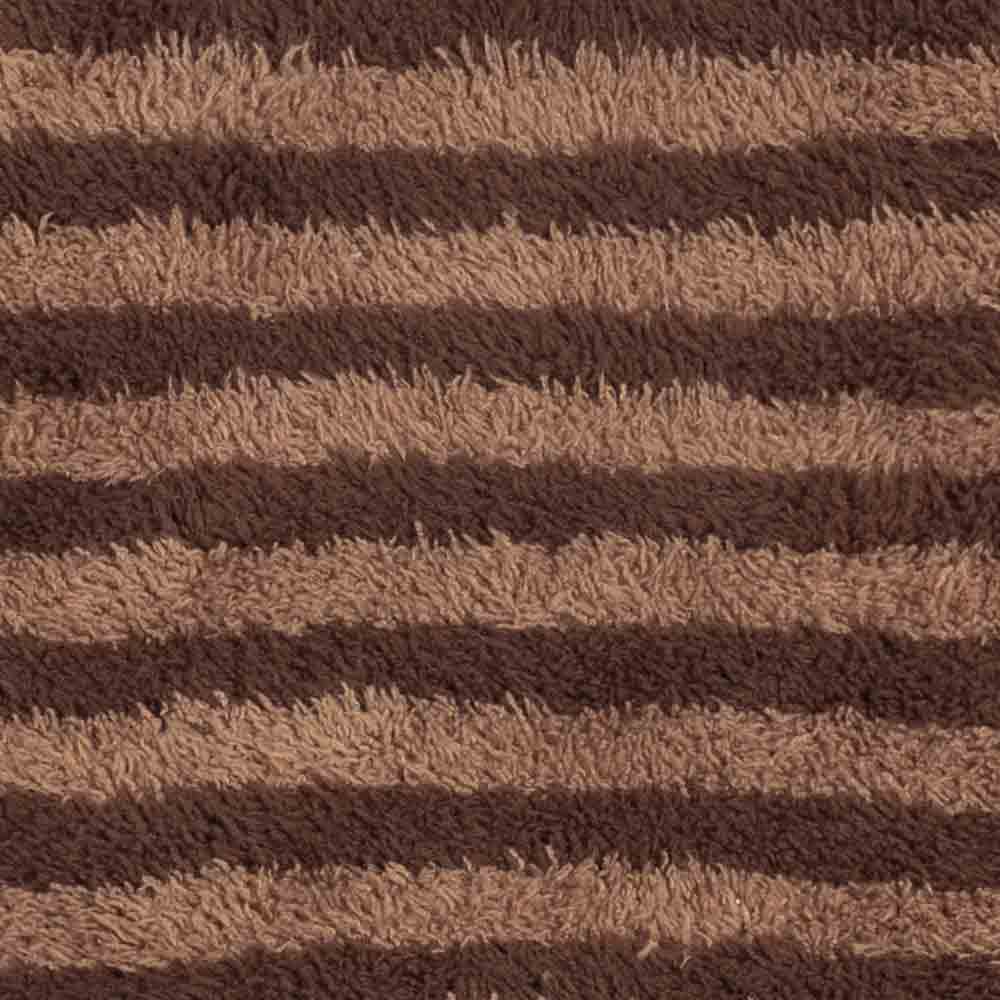 Close-up of brown striped fabric texture